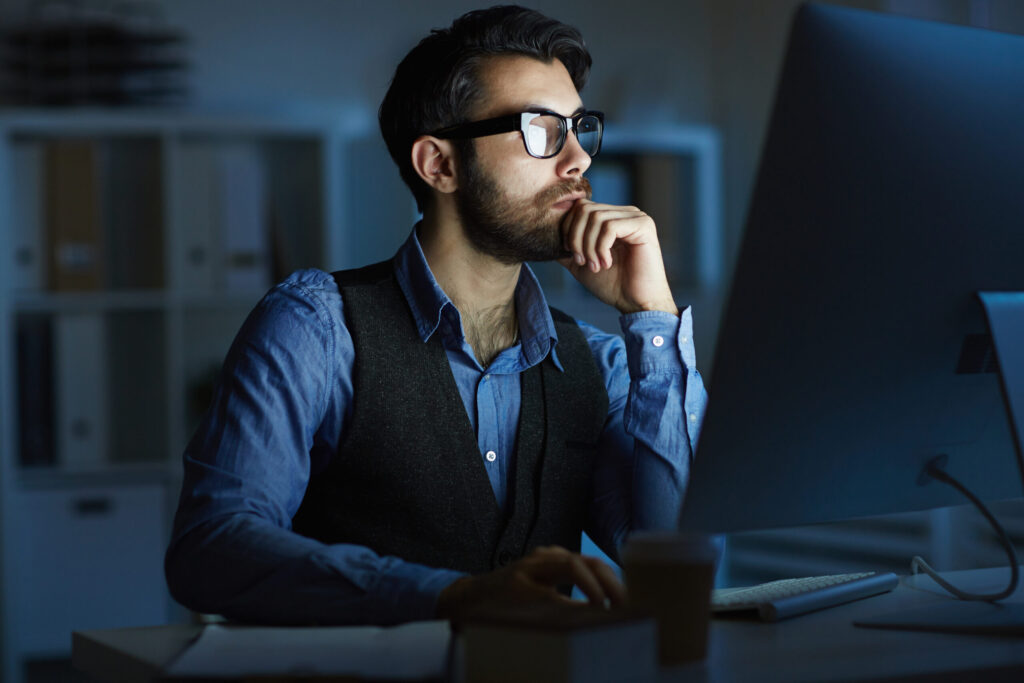 IT professional monitoring systems late at night