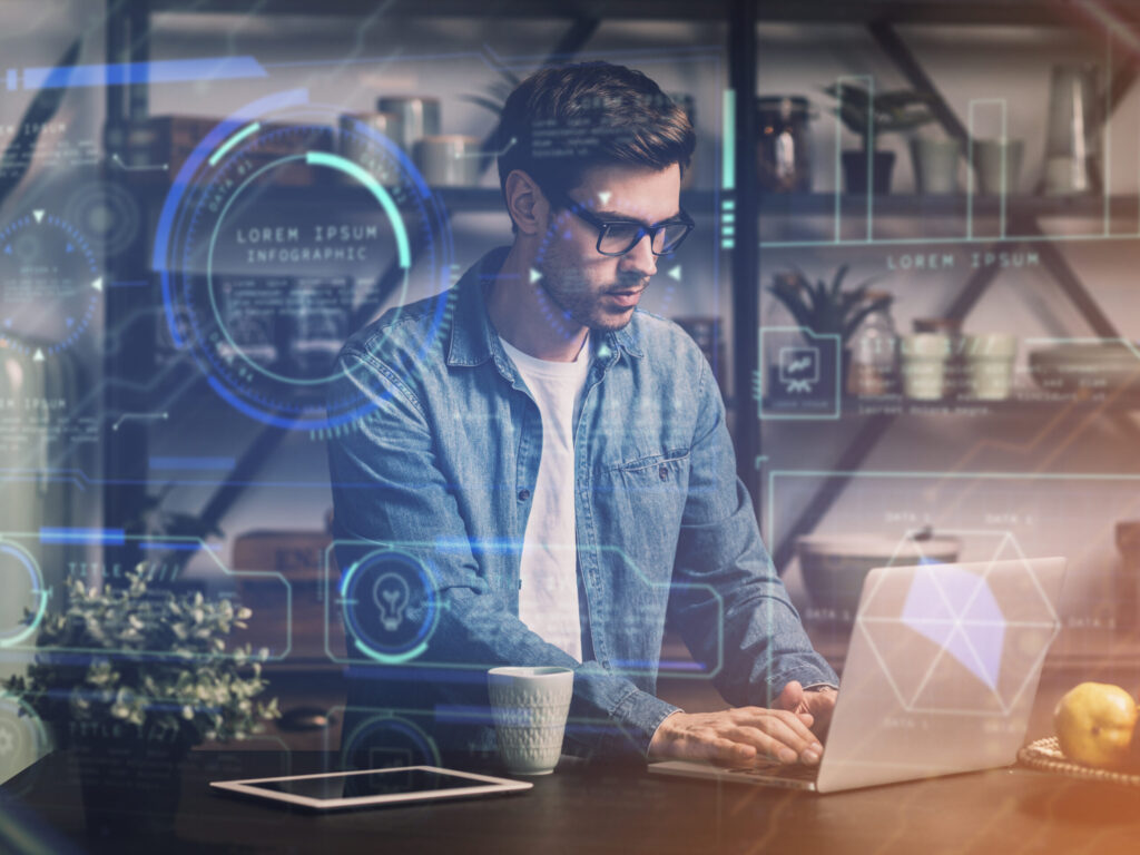 IT specialist working with code on a computer, overlaid with tech data graphics